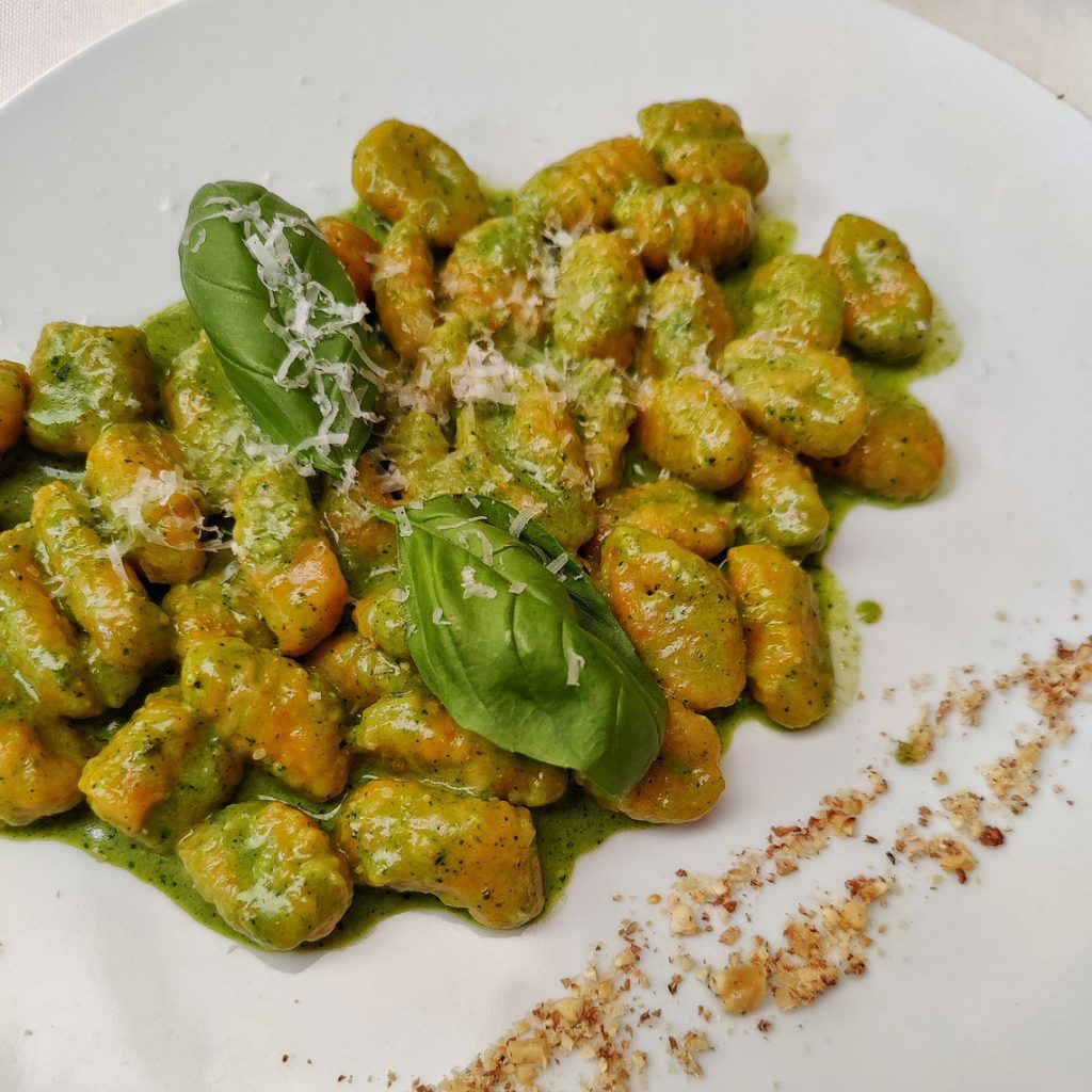 Carrot gnocchi with basil sauce